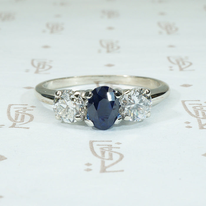 18k white gold sapphire and diamond 3 stone ring