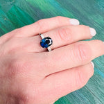 Deep Blue Oval Sapphire and Diamond Platinum Engagement Ring