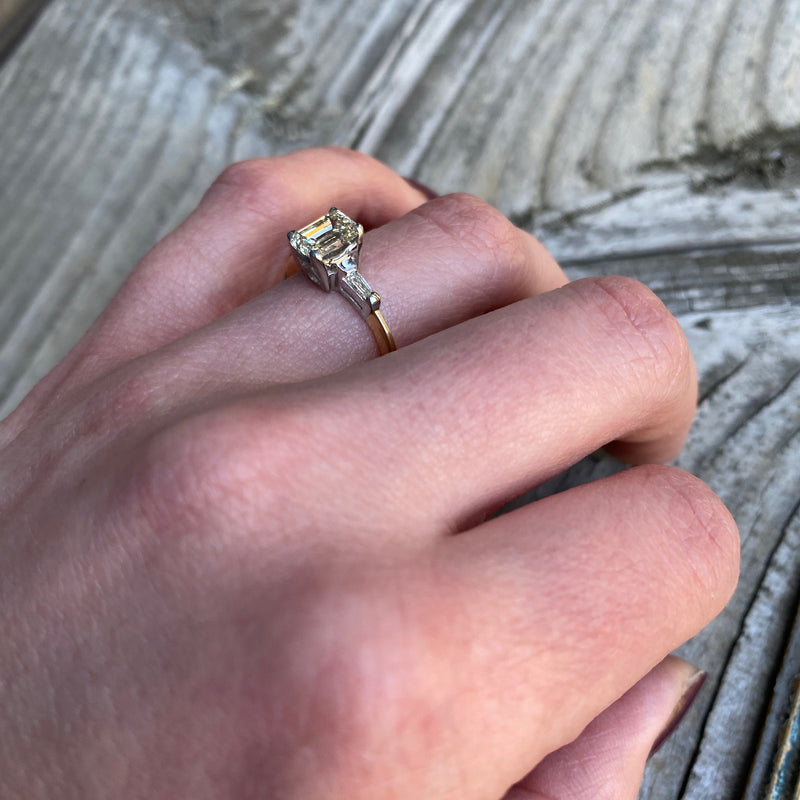 Classic and Unique Emerald Step Cut Diamond Ring