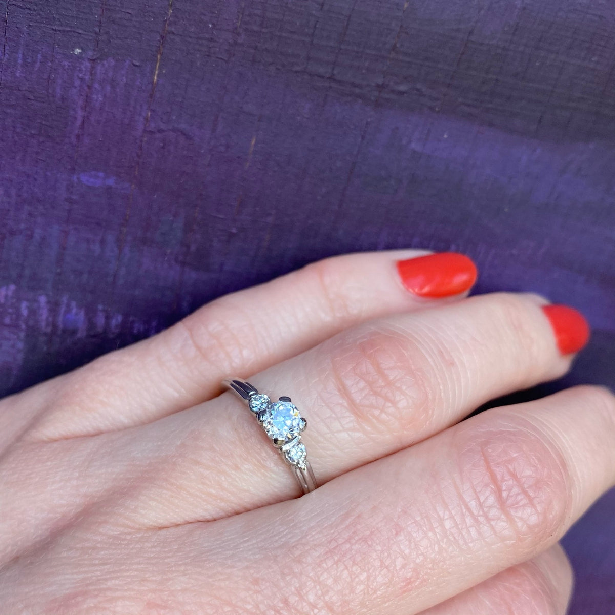 Tasteful Retro Three Stone Engagement Ring
