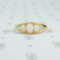 5 graduated opals in 18k yellow gold