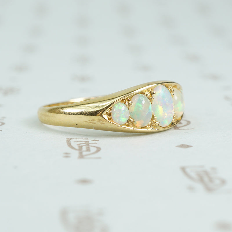 5 graduated opals in 18k yellow gold side view