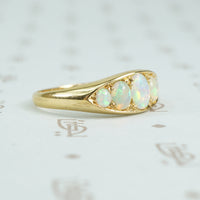 5 graduated opals in 18k yellow gold side view