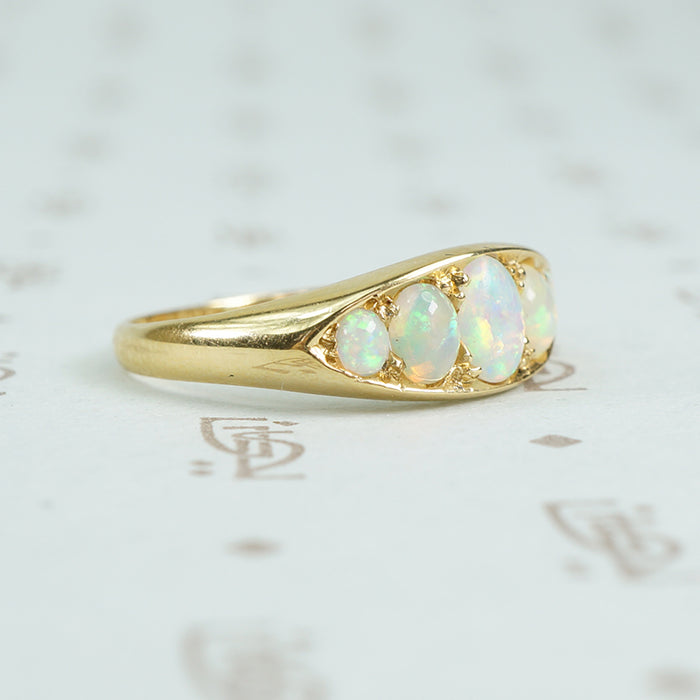 5 graduated opals in 18k yellow gold side view
