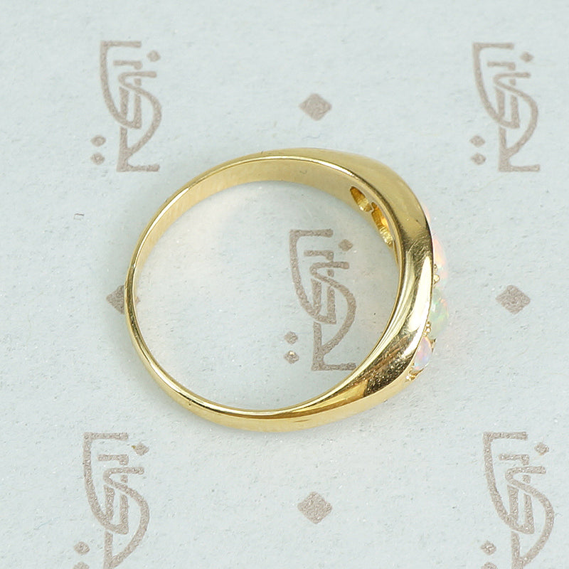 5 graduated opals in 18k yellow gold