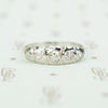 18k white gold 5 diamond band sculpted top set with omc diamonds