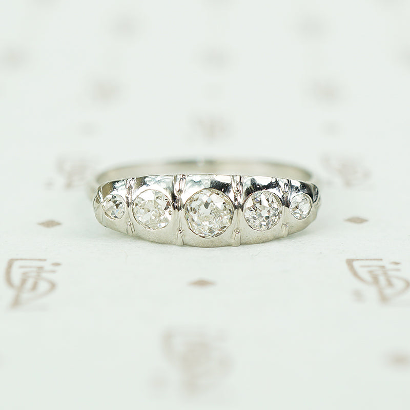18k white gold 5 diamond band sculpted top set with omc diamonds