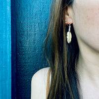 Silver Feather Earrings with Rock & Roll Vibes