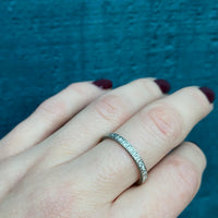 Arrows and Flowers a Platinum Deco Diamond Band