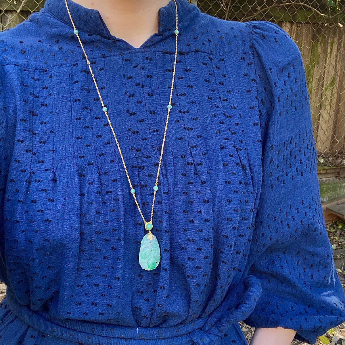 Carved Jade Plum Pendant on Decorative Gold Chain