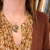 Pearlescent Ammonite Fossil in Sterling Pendant