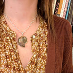 Pearlescent Ammonite Fossil in Sterling Pendant