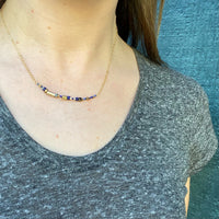 Vivid Blue Lapis & Brass Bead Arc Necklace by Brin