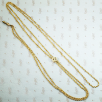 Pretty long elegant yellow gold filled twisted rope chain with a shield shaped slide and watch hook