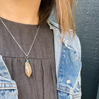 Adorable Carved Snail Shell Corn Maiden Pendant