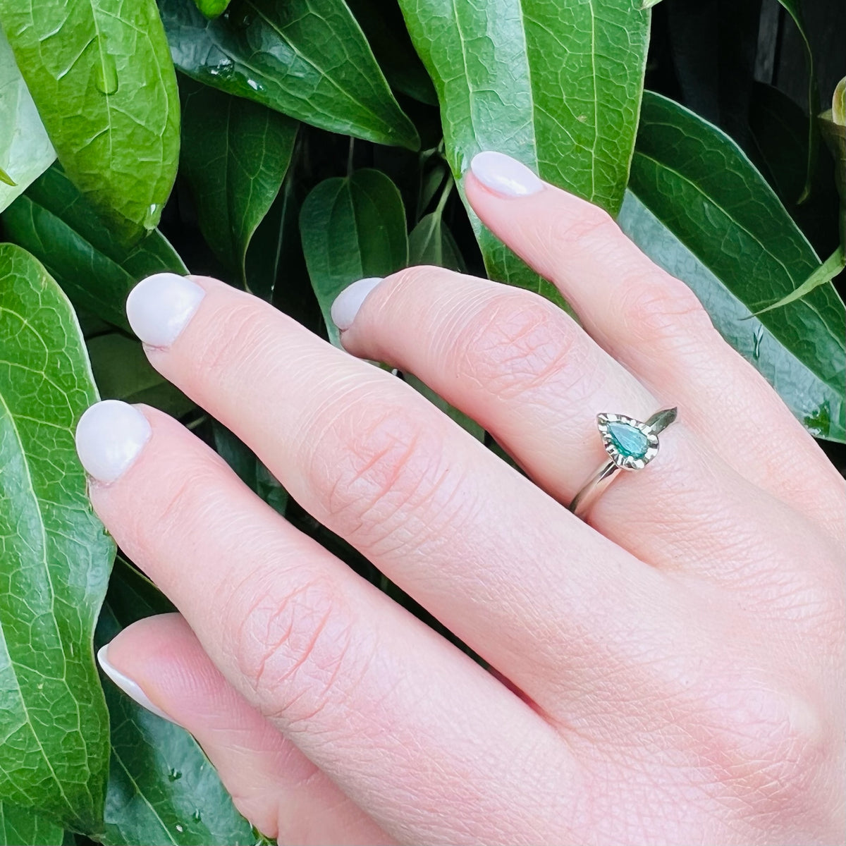 Vibrant Pear Cut Emerald Solitaire by 720