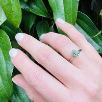 Vibrant Pear Cut Emerald Solitaire by 720