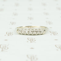 vintage 7 diamond band in 14k white gold circa 1940