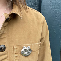 She Who Watches Brooch by Lillian Pitt