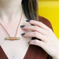 The Small Cleat Necklace by Local Artist