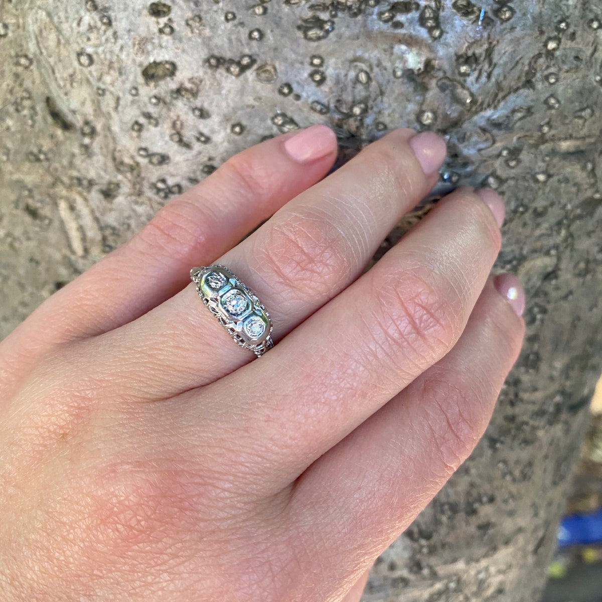1920's White Gold Filigree Three Diamond Ring