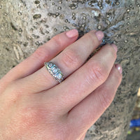 1920's White Gold Filigree Three Diamond Ring