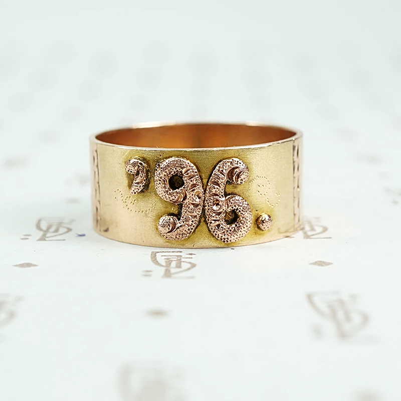 1896 date ring cigar band style with rose gold applied numbers