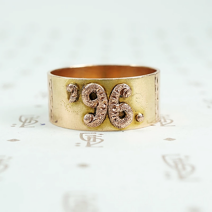 1896 date ring cigar band style with rose gold applied numbers