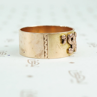 1896 date ring cigar band style with rose gold applied numbers side detail of hand engraving