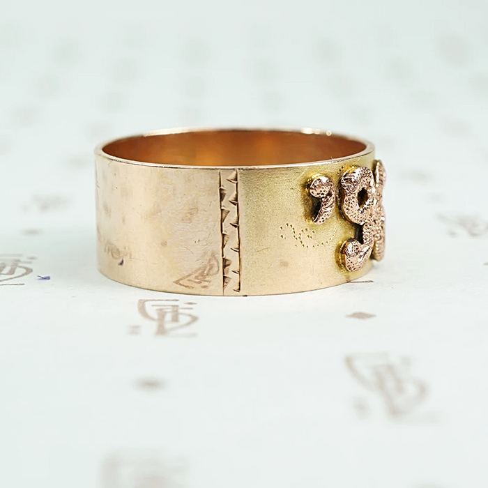 1896 date ring cigar band style with rose gold applied numbers side detail of hand engraving