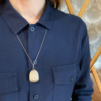 Carved Organics in Silver Pendant