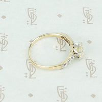 2 tone platinum and yellow gold vintage diamond engagement ring side view