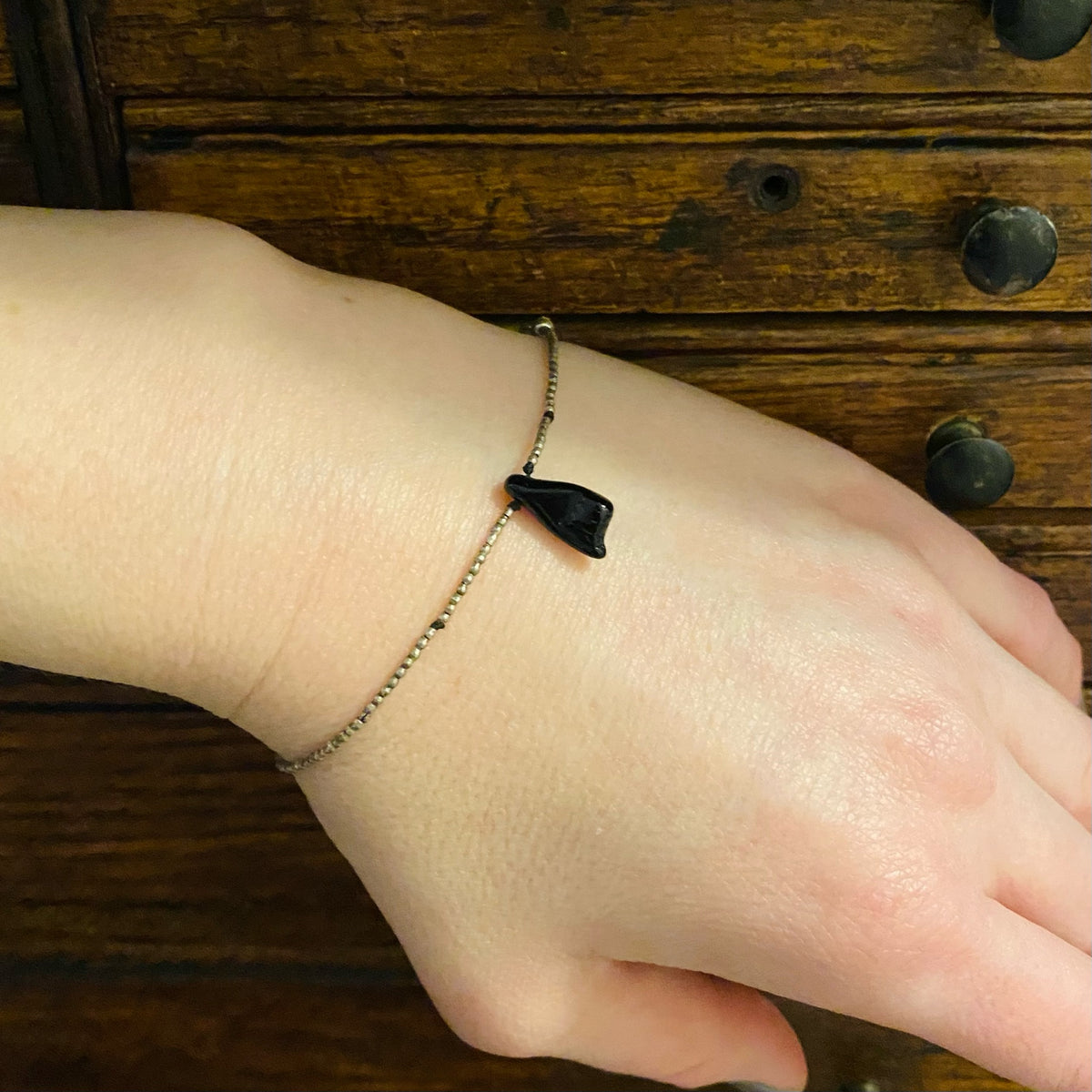 Tiny Silver Bead Bracelet with Glass Hand by Ancient Influences
