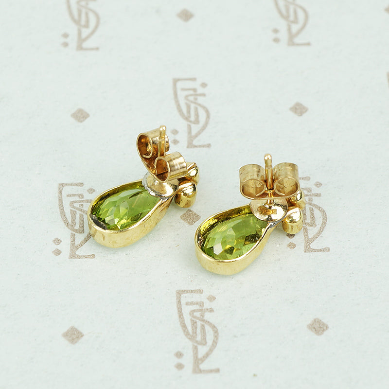 pear shaped peridot and pearl stud earrings back view