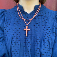 Deep Red Cross on a 36" Strand of Beads