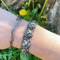 Cheerful Sterling Repoussé Daisy Bracelet