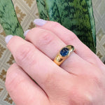 Regal Sapphire Cabochon in Curvaceous 18k Ring