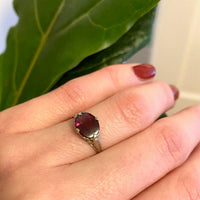 Raspberry Colored Buff Top Cut Garnet in White Gold