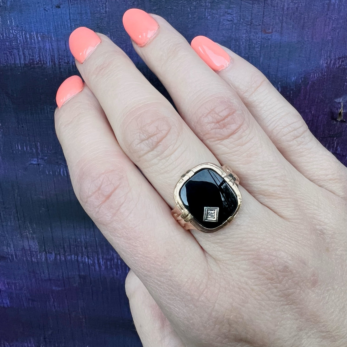 Charming Onyx Ring with Jaunty Diamond