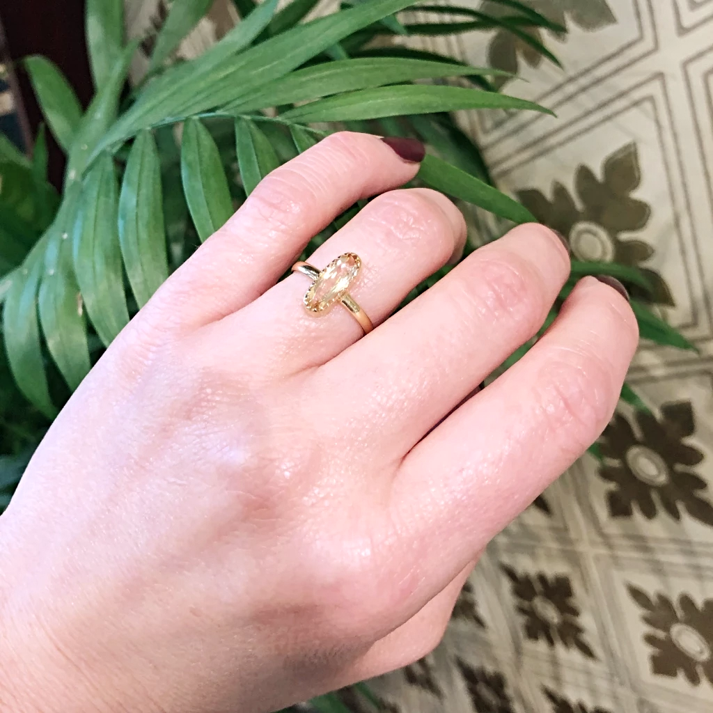 Elegant Imperial Topaz Solitaire in 18k Gold