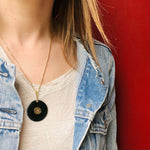 Inky Black Onyx Pendant with Gold Details