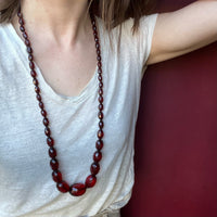Strand of Large Faceted Amber Barrel Beads