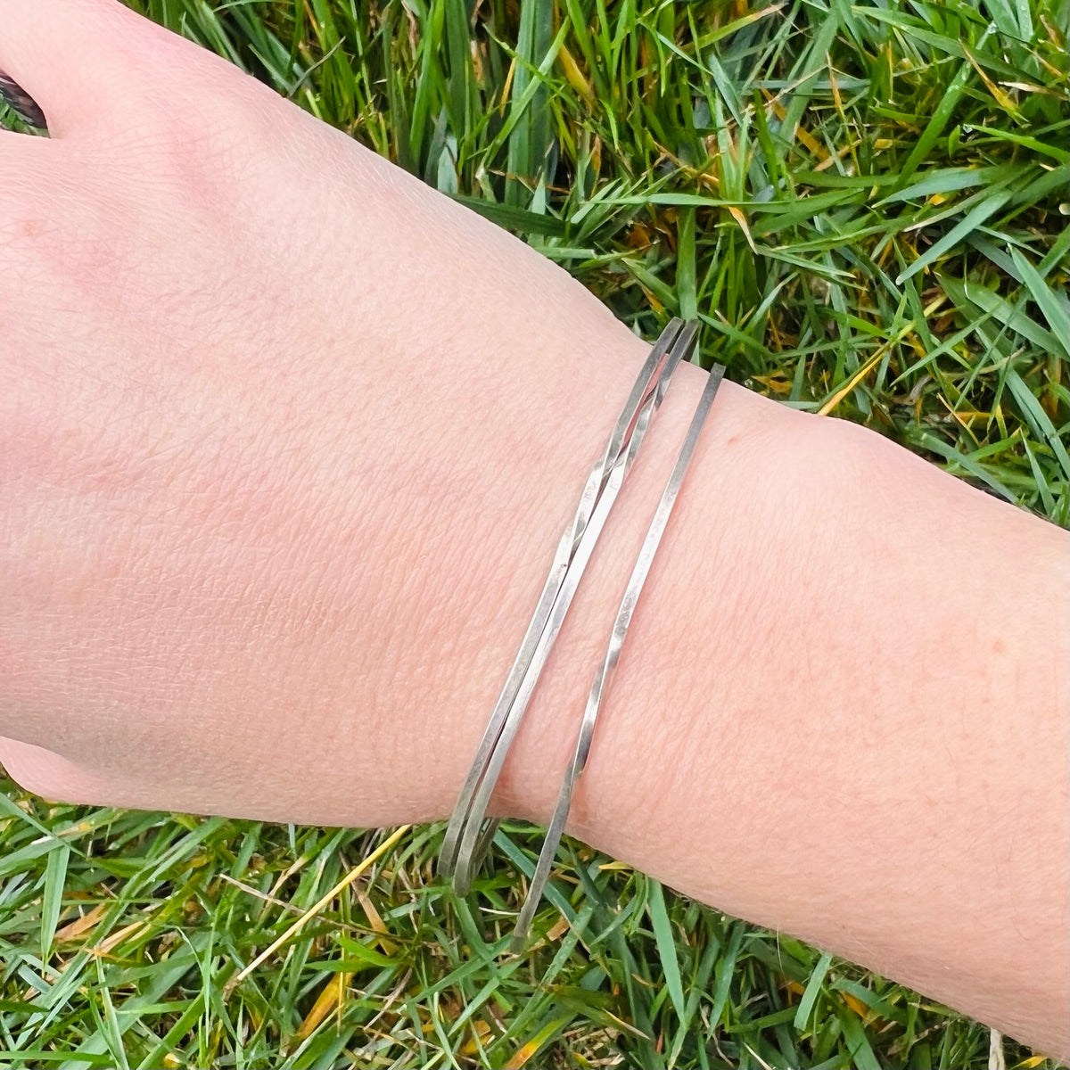 The Endless Twist Oval Bangle in Sterling from Allie B.