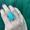 Serene Turquoise Ring with Rattlesnake Jaw Rockers