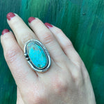 Serene Turquoise Ring with Rattlesnake Jaw Rockers
