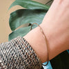 The Endless Twist Oval Bangle in Bronze from Allie B.