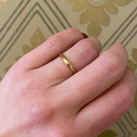 Elegantly Sculpted Gold Wedding Band