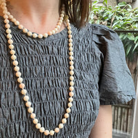 Long Angel Skin Beads with Gold Clasp