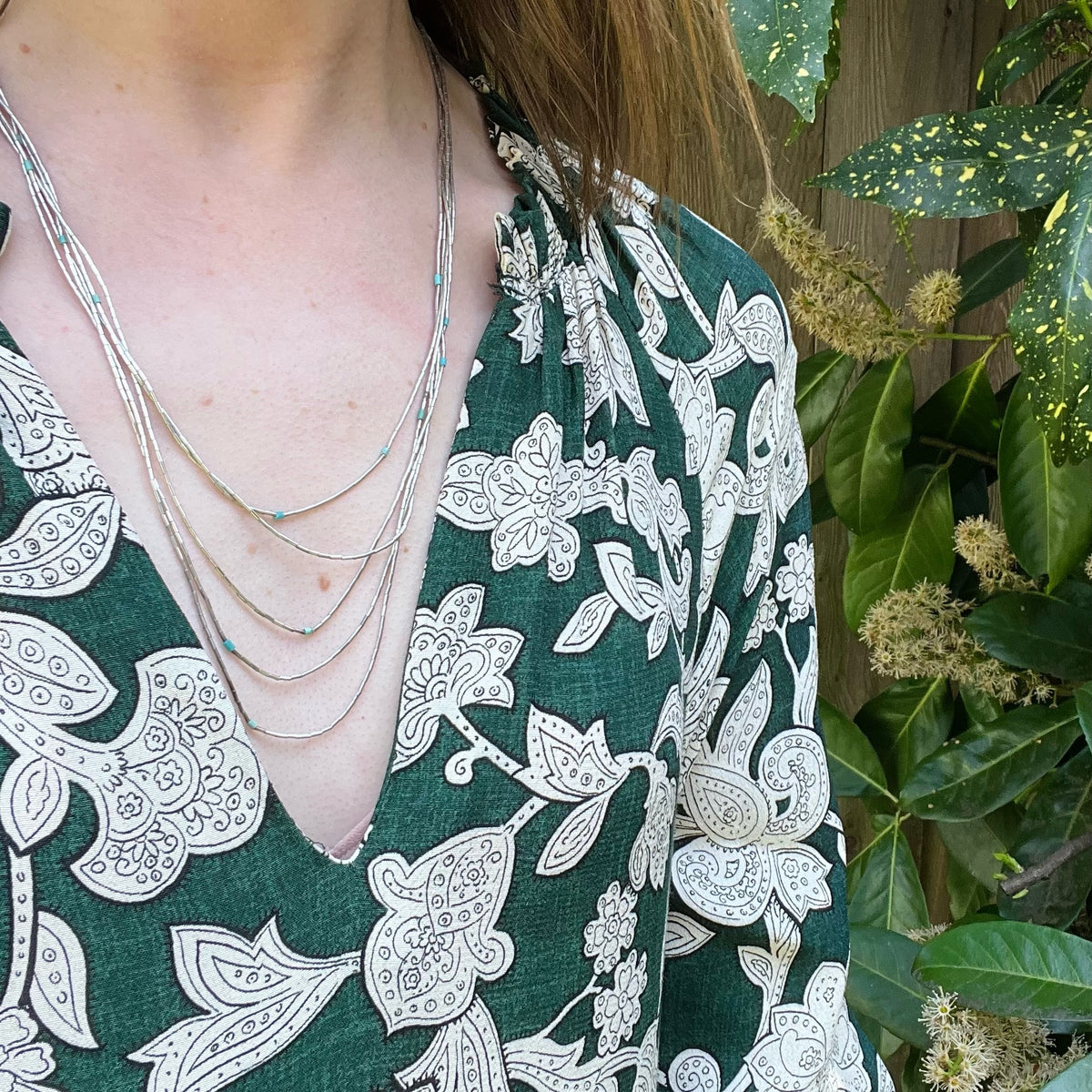 Slinky Liquid Silver Necklace with Turquoise Beads