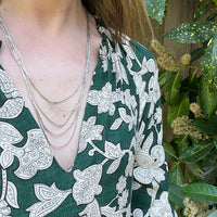 Slinky Liquid Silver Necklace with Turquoise Beads